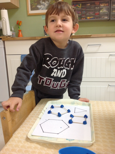 Making shapes with playdoh and toothpicks
