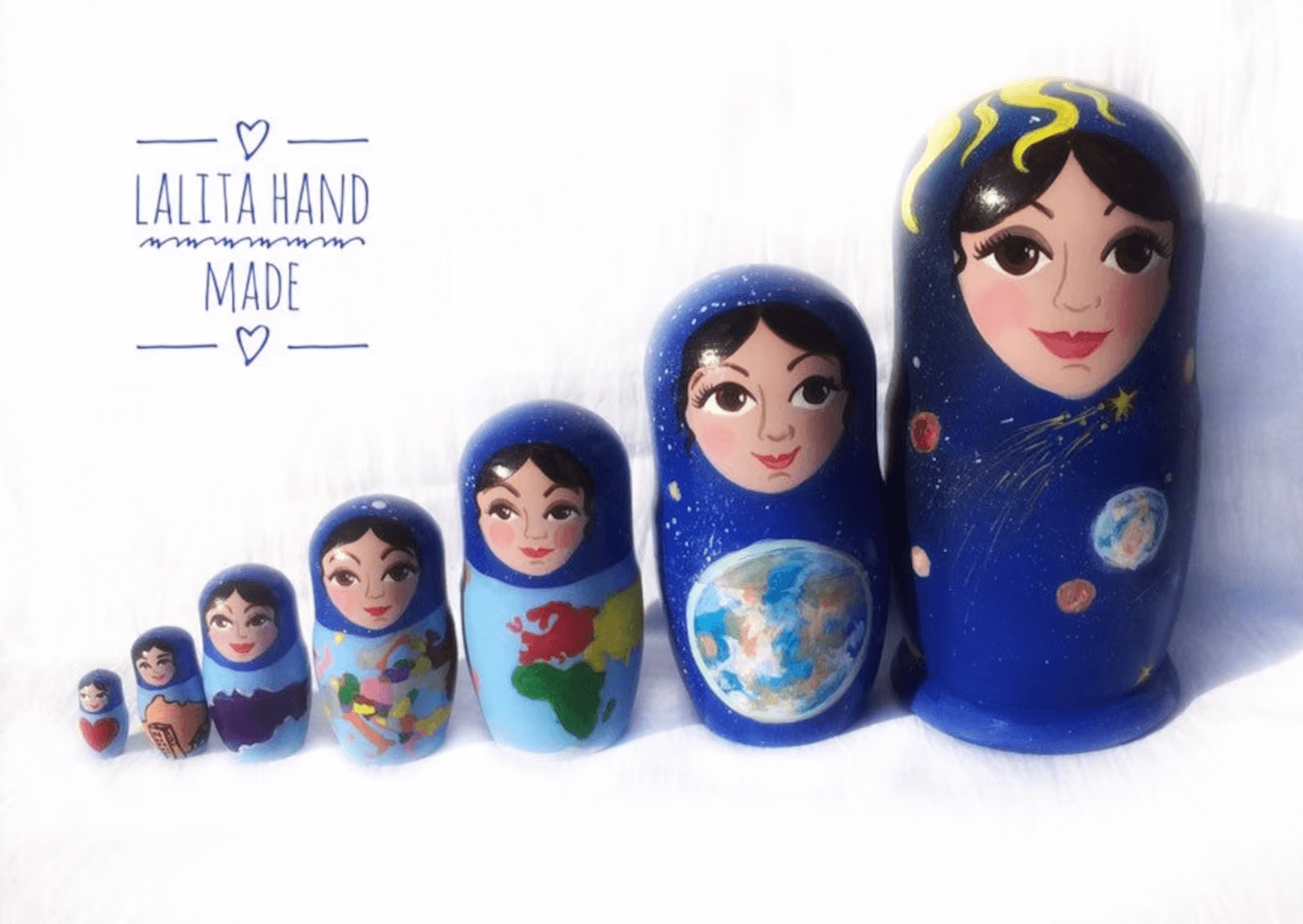 hand painted Montessori cosmic nesting dolls by lalita dolls