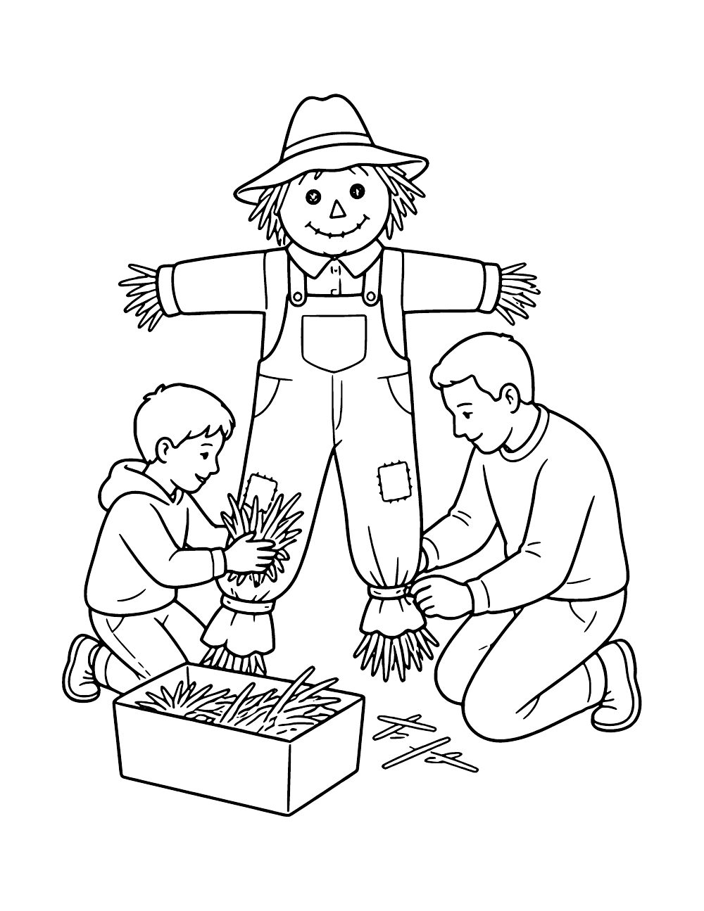 Child and adult kneeling beside a scarecrow in patched overalls, adding straw and tying a trouser cuff, with a box of straw nearby.
